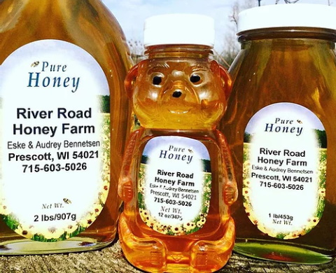 Raw honey in bottles for sale.